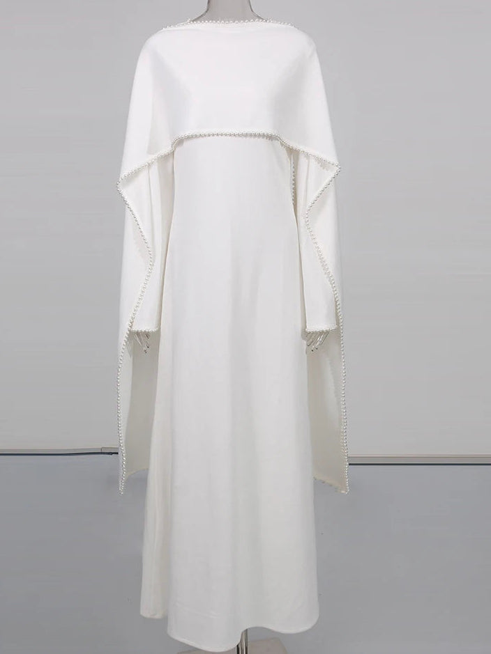 Henny Abaya mit Perlen