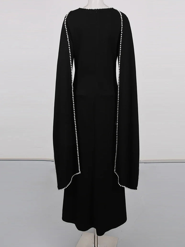 Henny Abaya mit Perlen