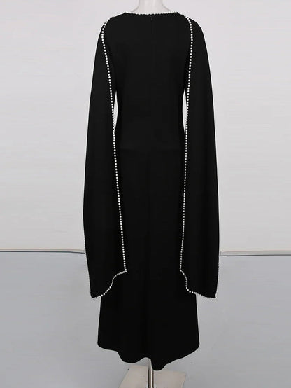 Henny Abaya mit Perlen