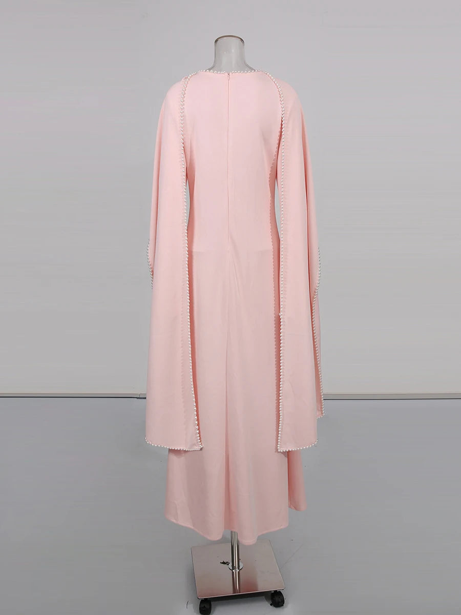 Henny Abaya mit Perlen