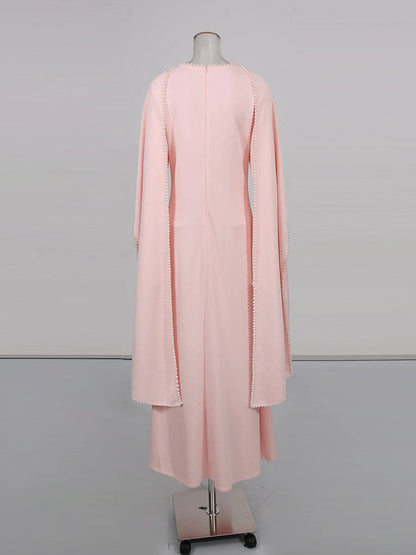 Henny Abaya mit Perlen