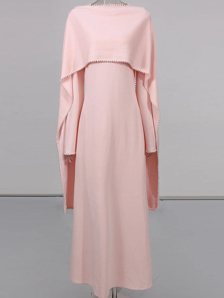 Henny Abaya mit Perlen