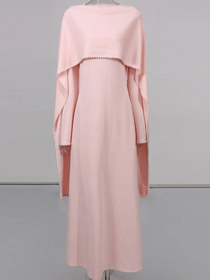 Henny Abaya mit Perlen