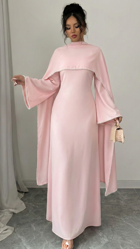 Henny Abaya mit Perlen