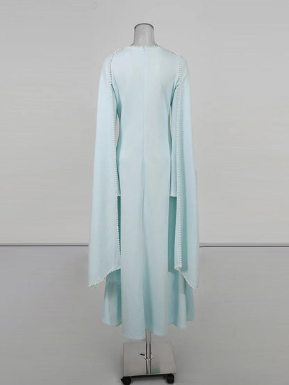 Henny Abaya mit Perlen