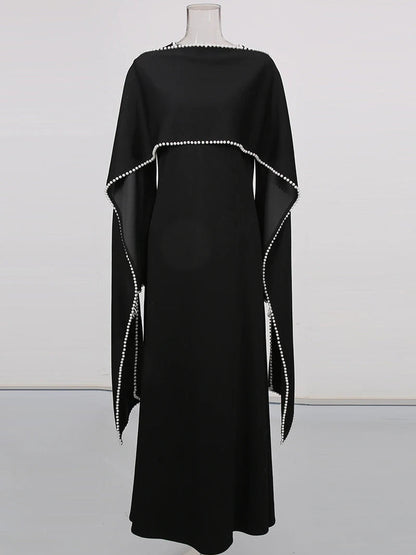 Henny Abaya mit Perlen