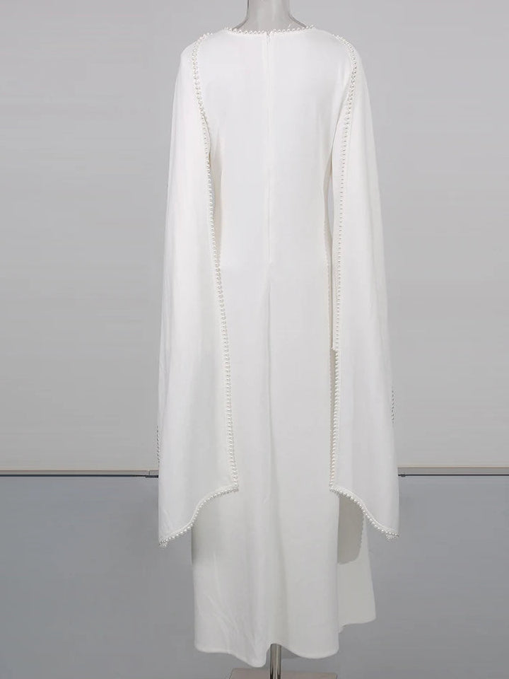 Henny Abaya mit Perlen