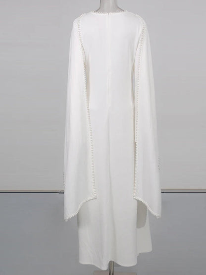 Henny Abaya mit Perlen